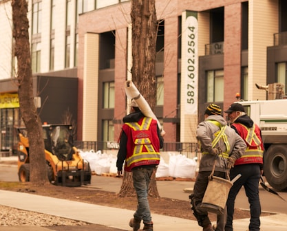 a group of men walking down a street