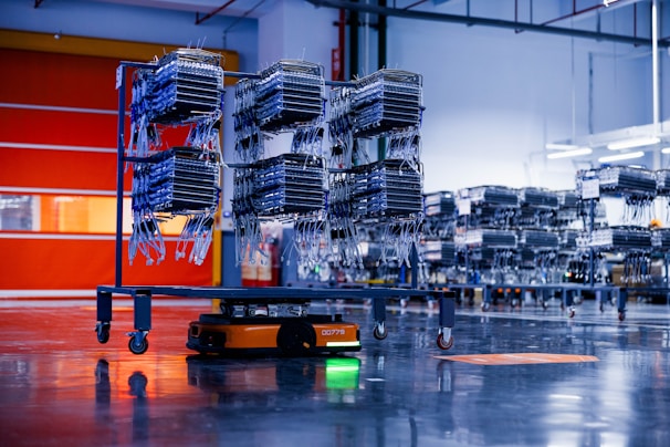 a large group of boxes sitting on top of a conveyor belt