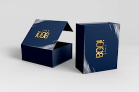a blue box with a gold logo on it