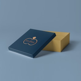 a blue box with a gold logo on it