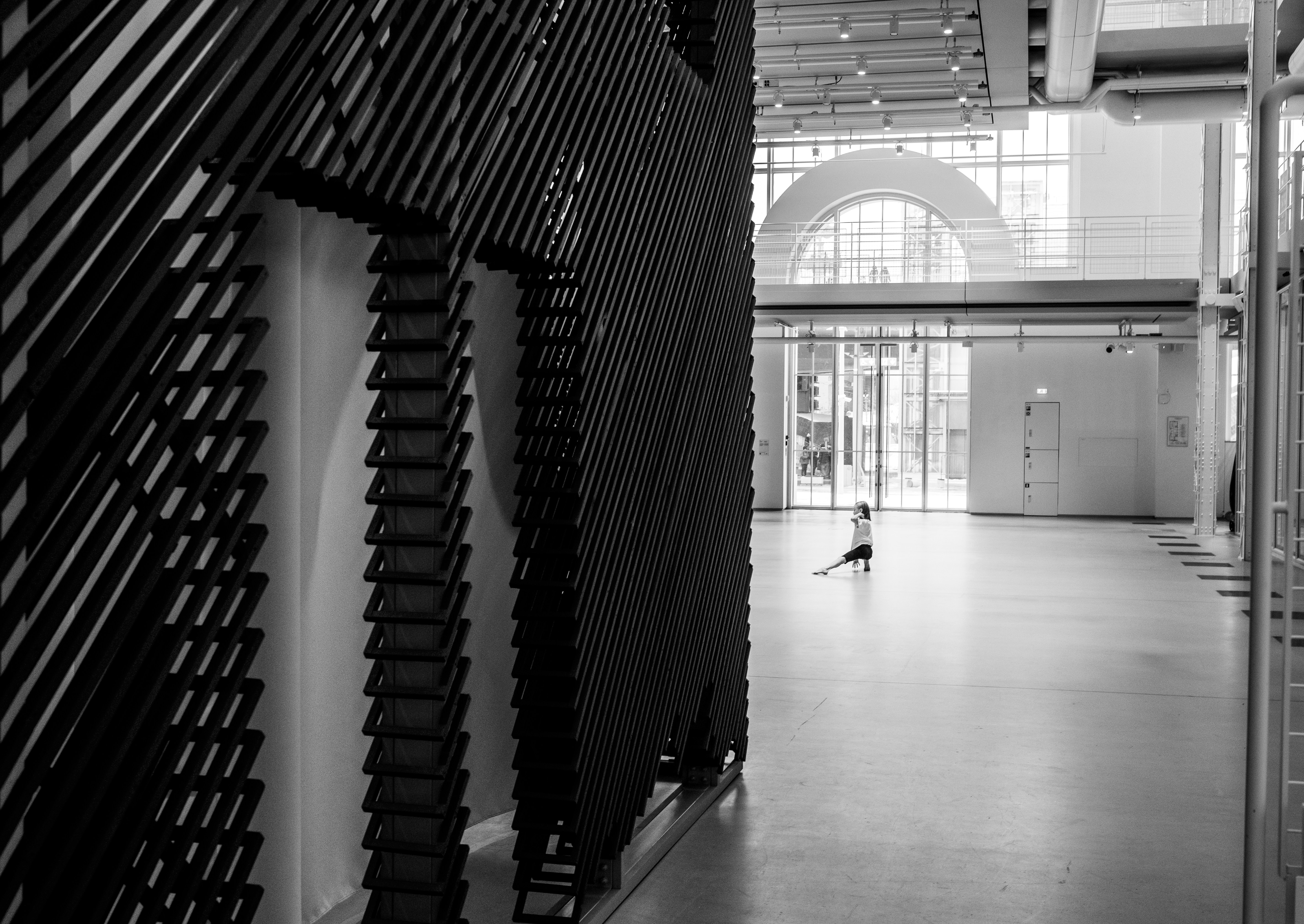 a black and white photo of a hallway