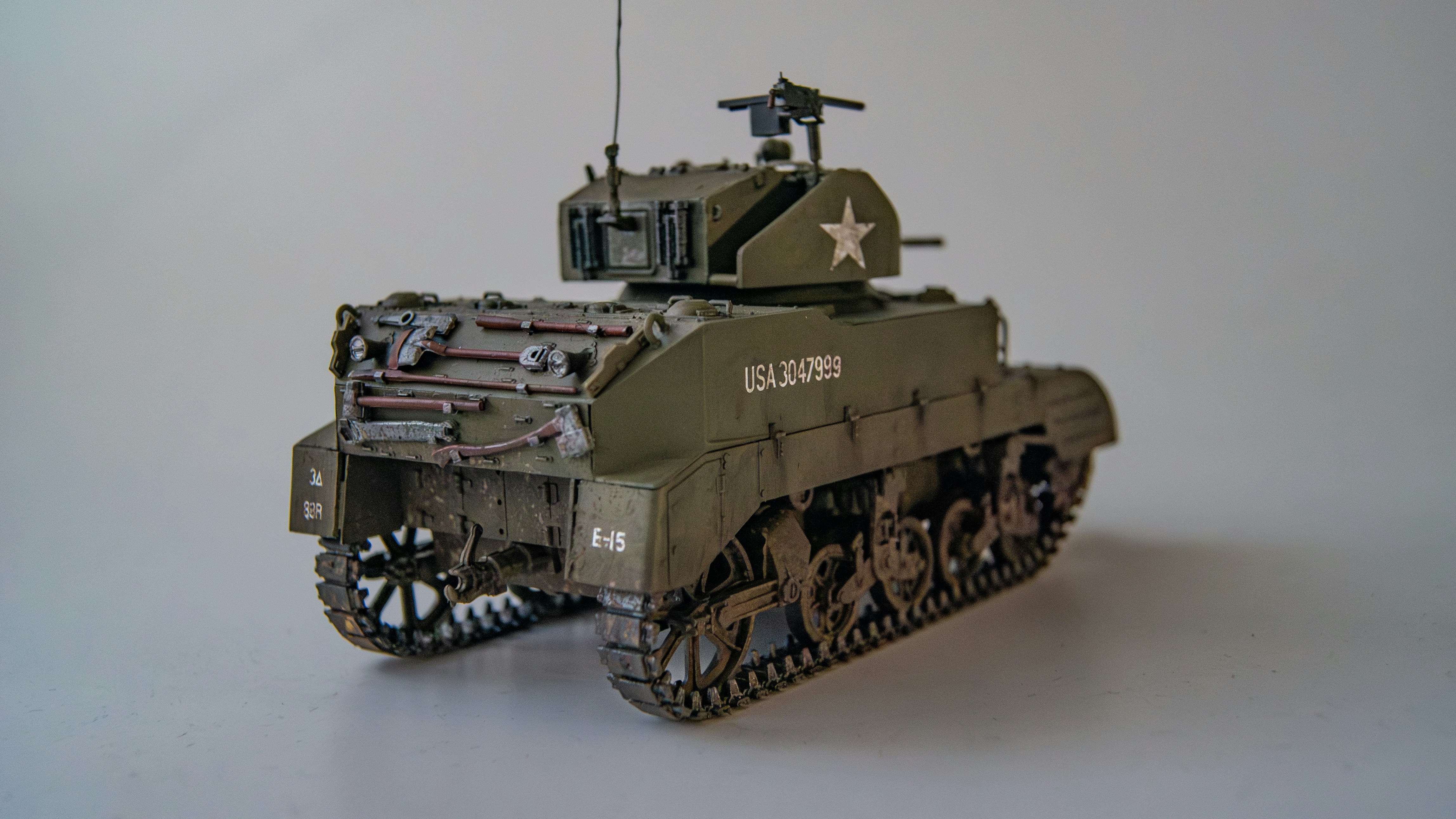 a toy army tank with a star on it