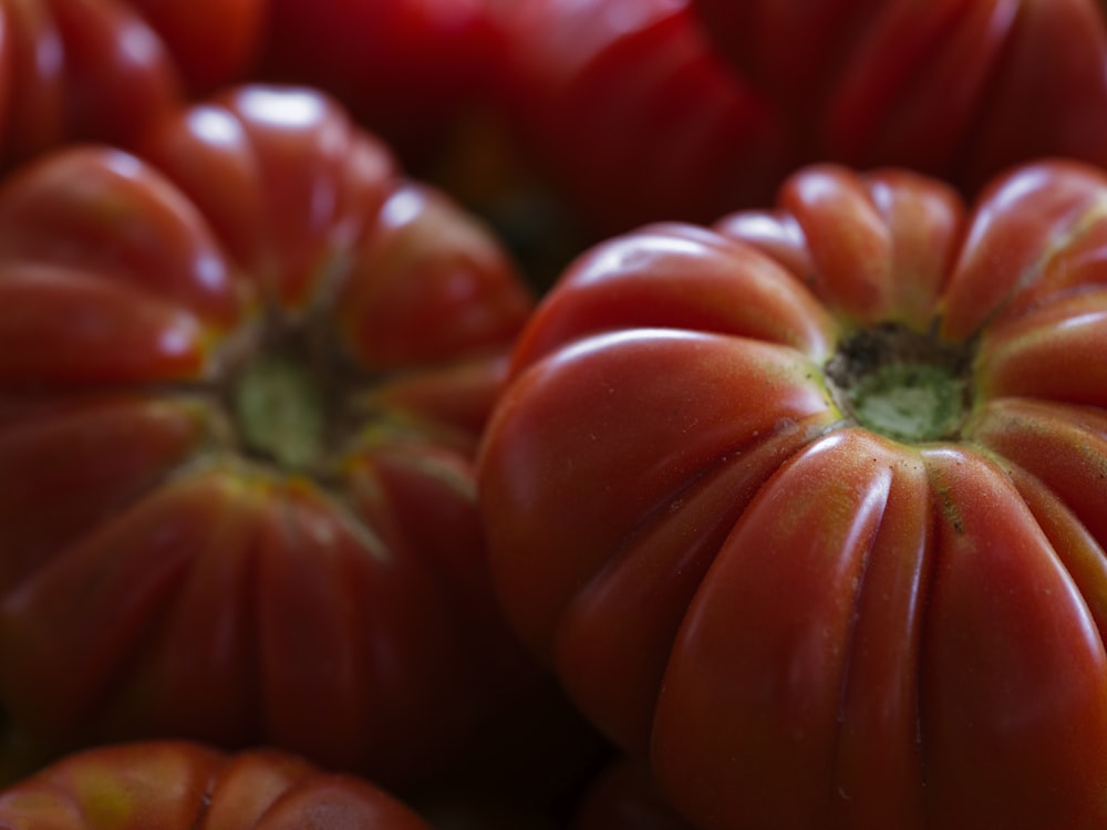 a close up of a bunch of tomatoes