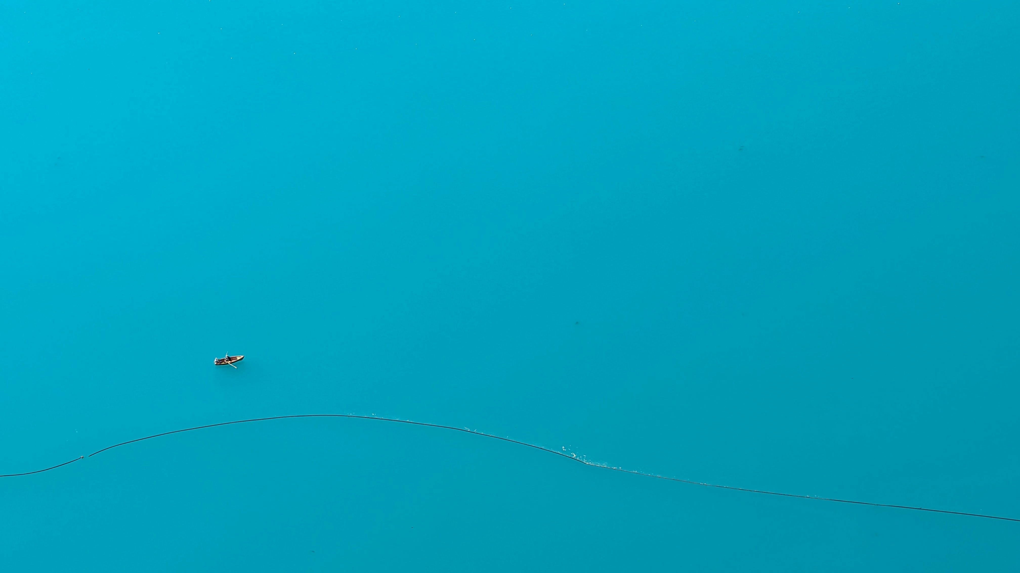 an aerial view of a kite flying in the sky
