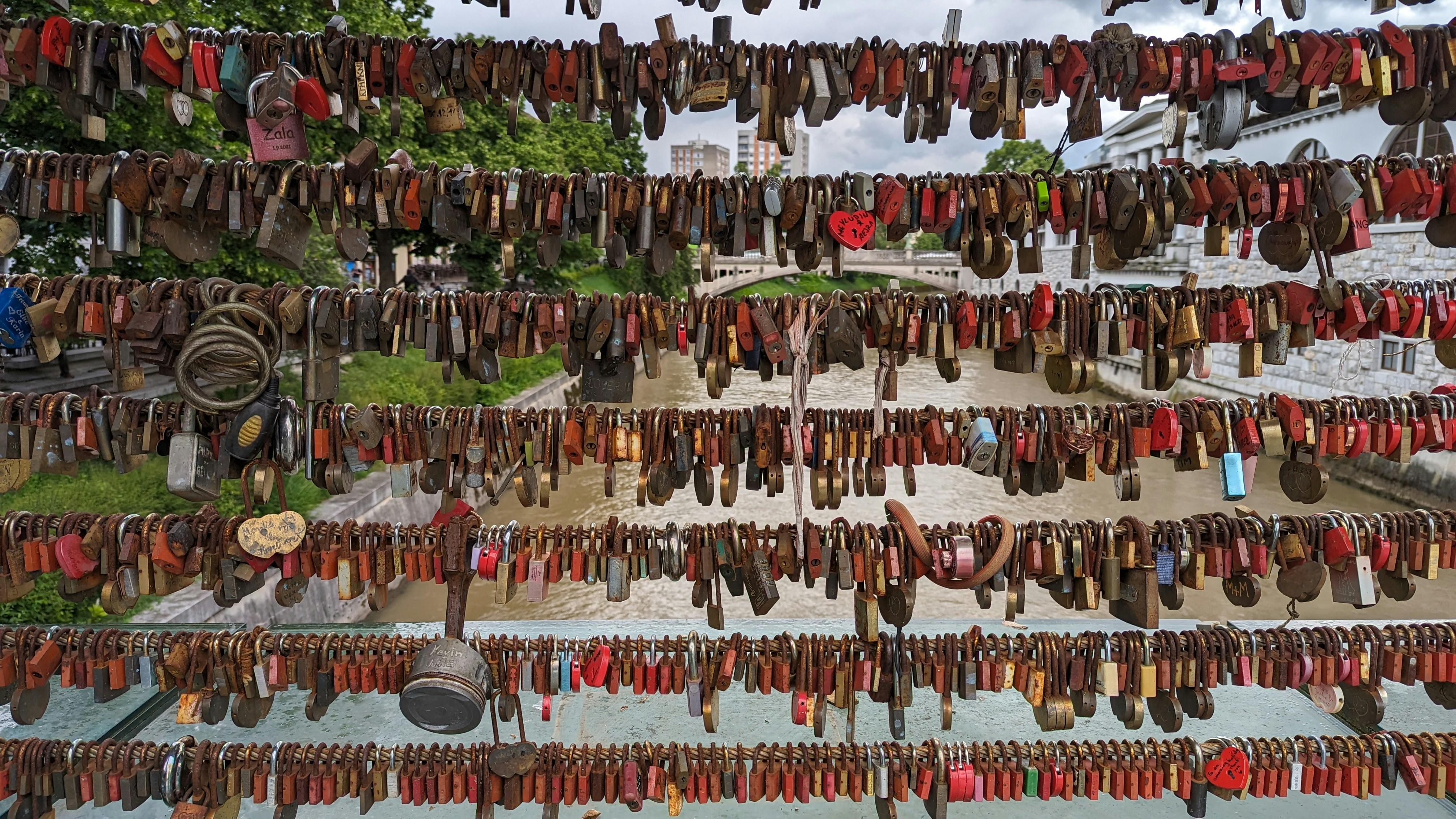 a number of shoes hanging on a line