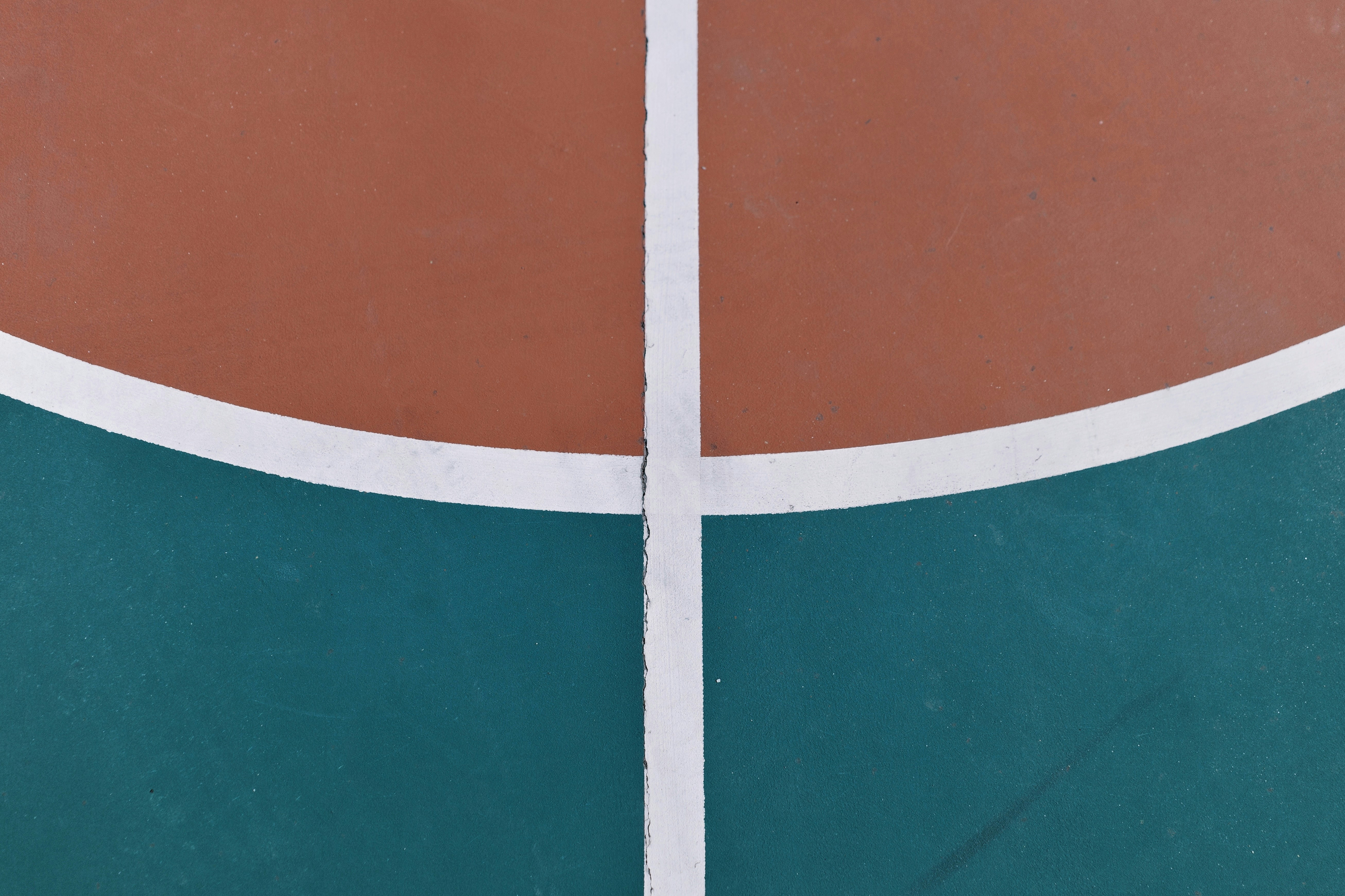 Close-up of tennis court surface options