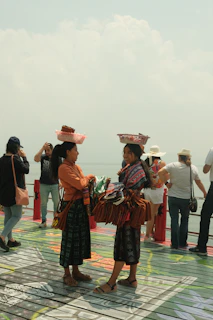 a couple of women standing next to each other