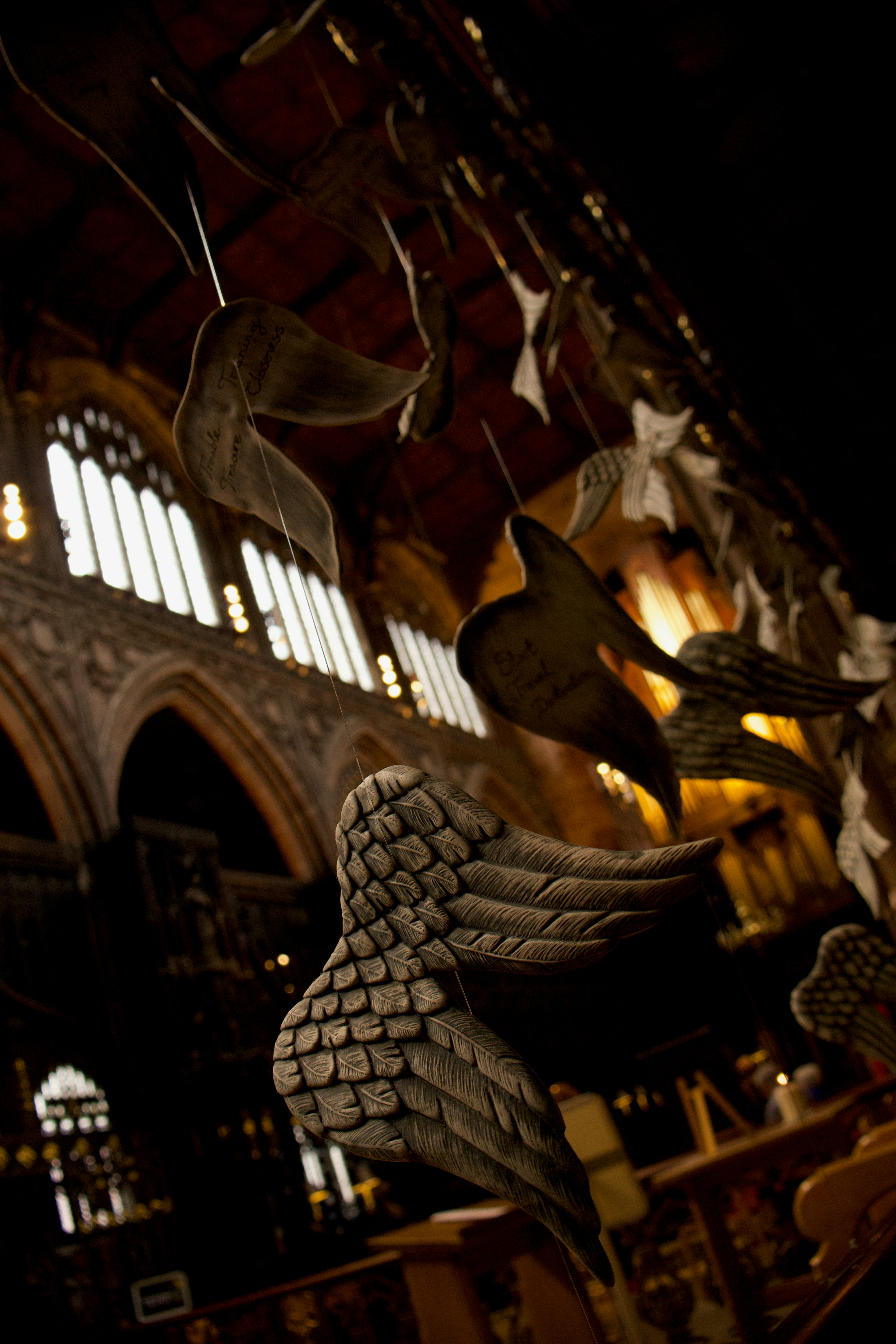 a close up of a sculpture of a bird in a building