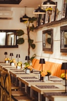 a long table with a bunch of flowers on it