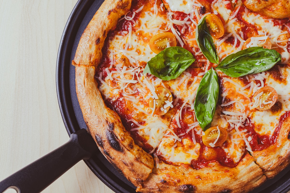 Can You Make Better Pizza in a Cast Iron Skillet Than a Pizza Stone?