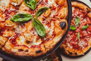 a close up of a pizza on a plate