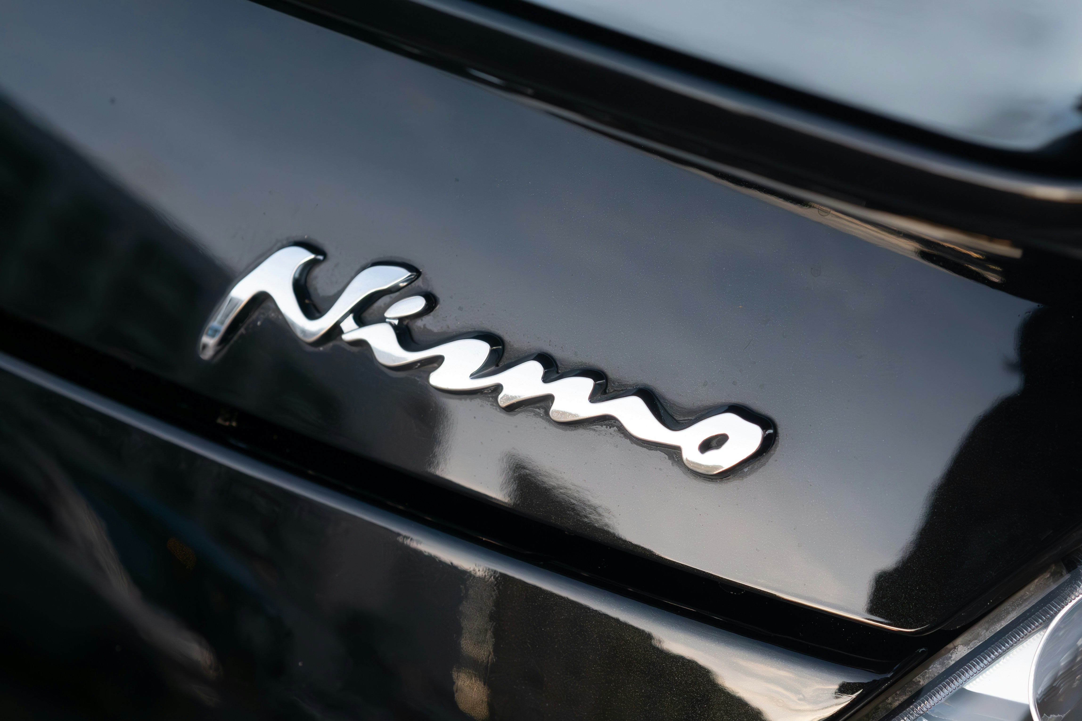 a close up of the name of a car