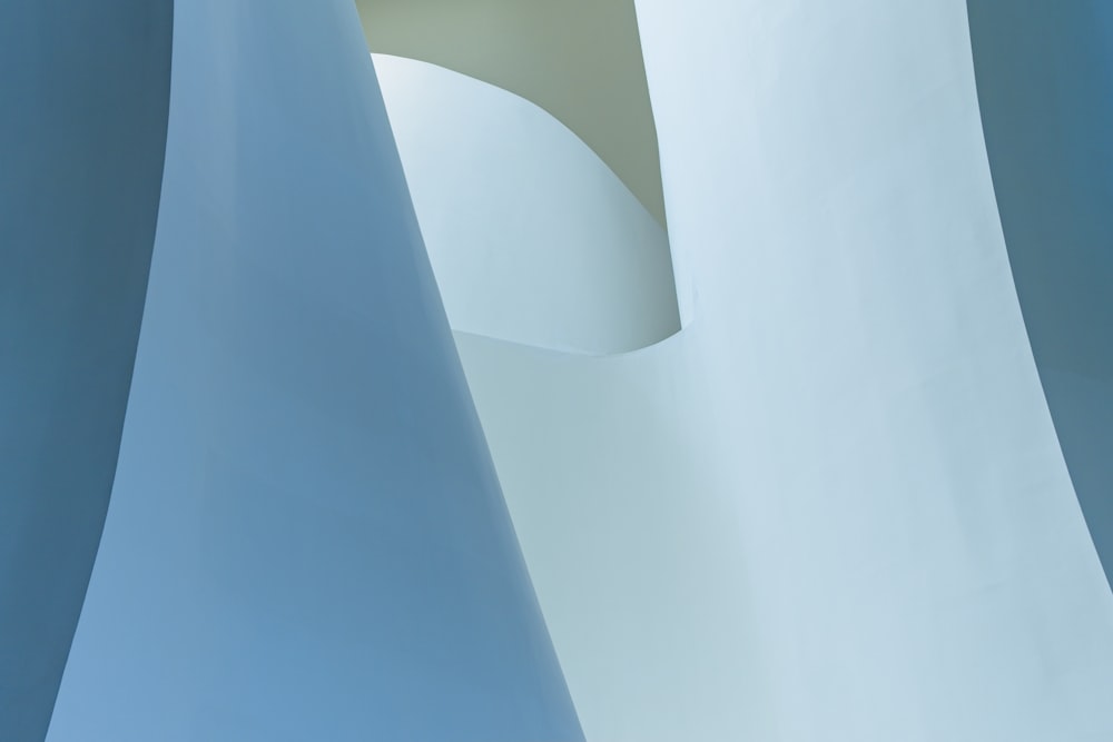 an abstract photo of a white and blue structure