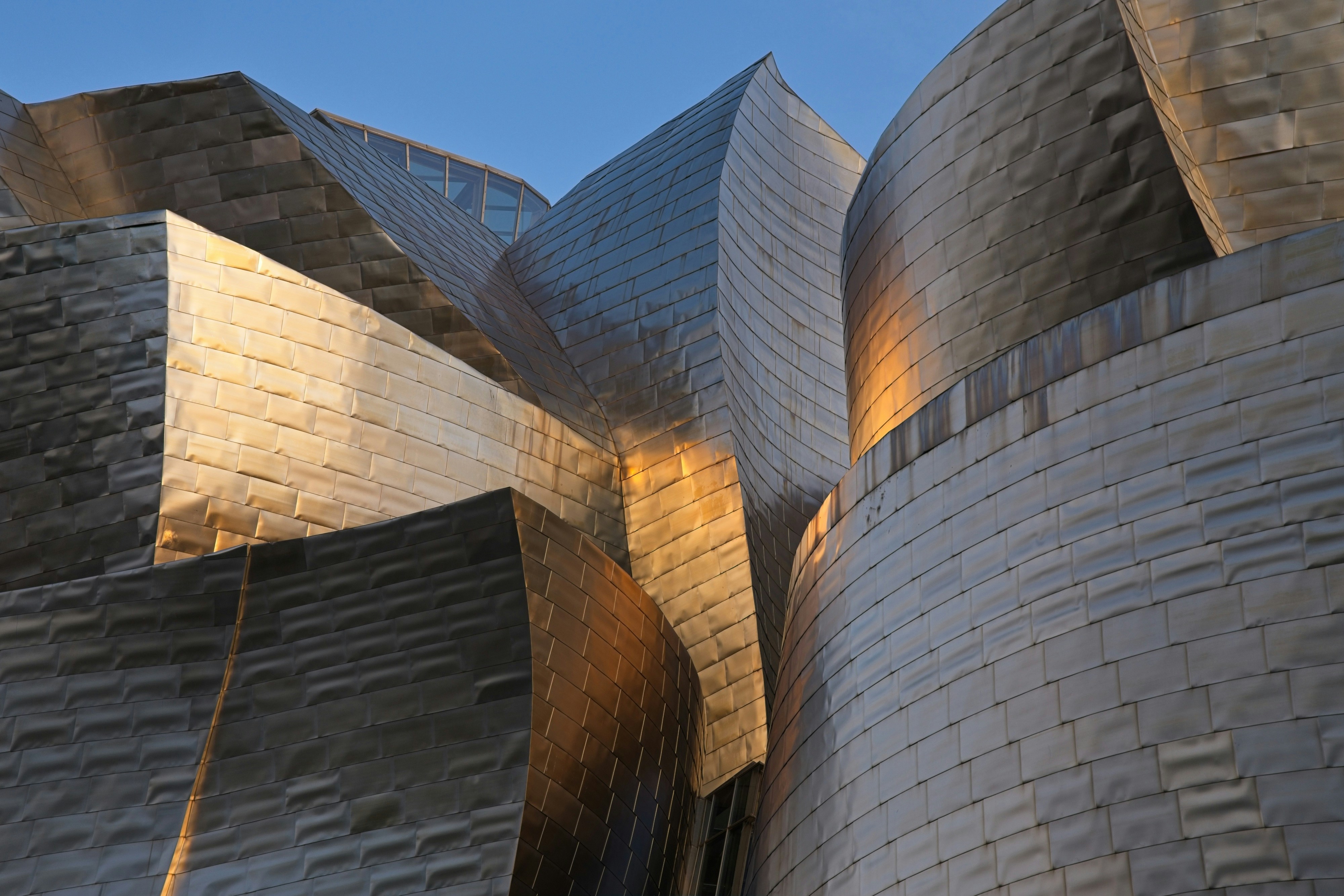 a close up of a building with a sky background