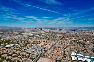 an aerial view of a city with lots of buildings