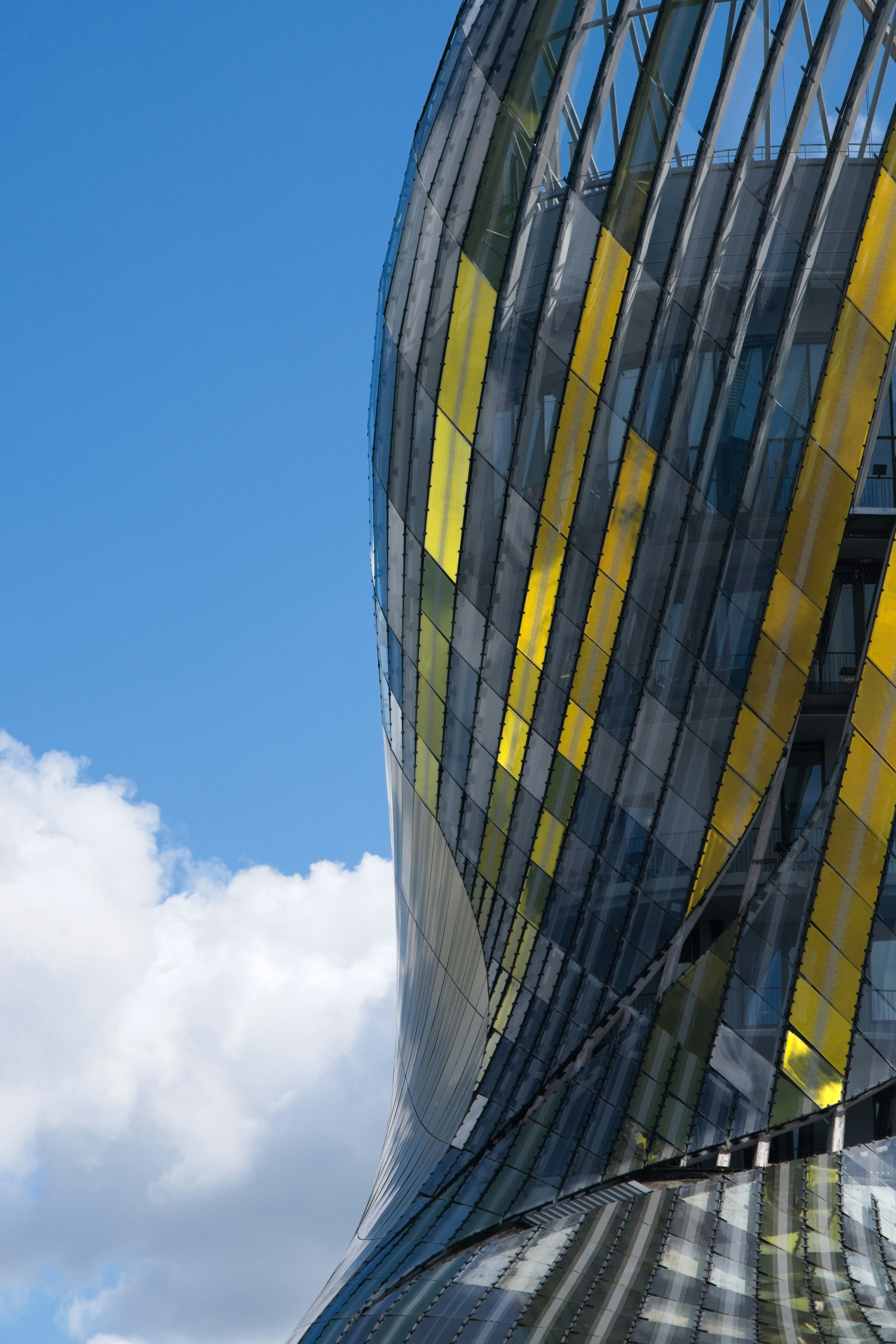 a building that has a yellow and black stripe on it