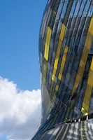 a building that has a yellow and black stripe on it