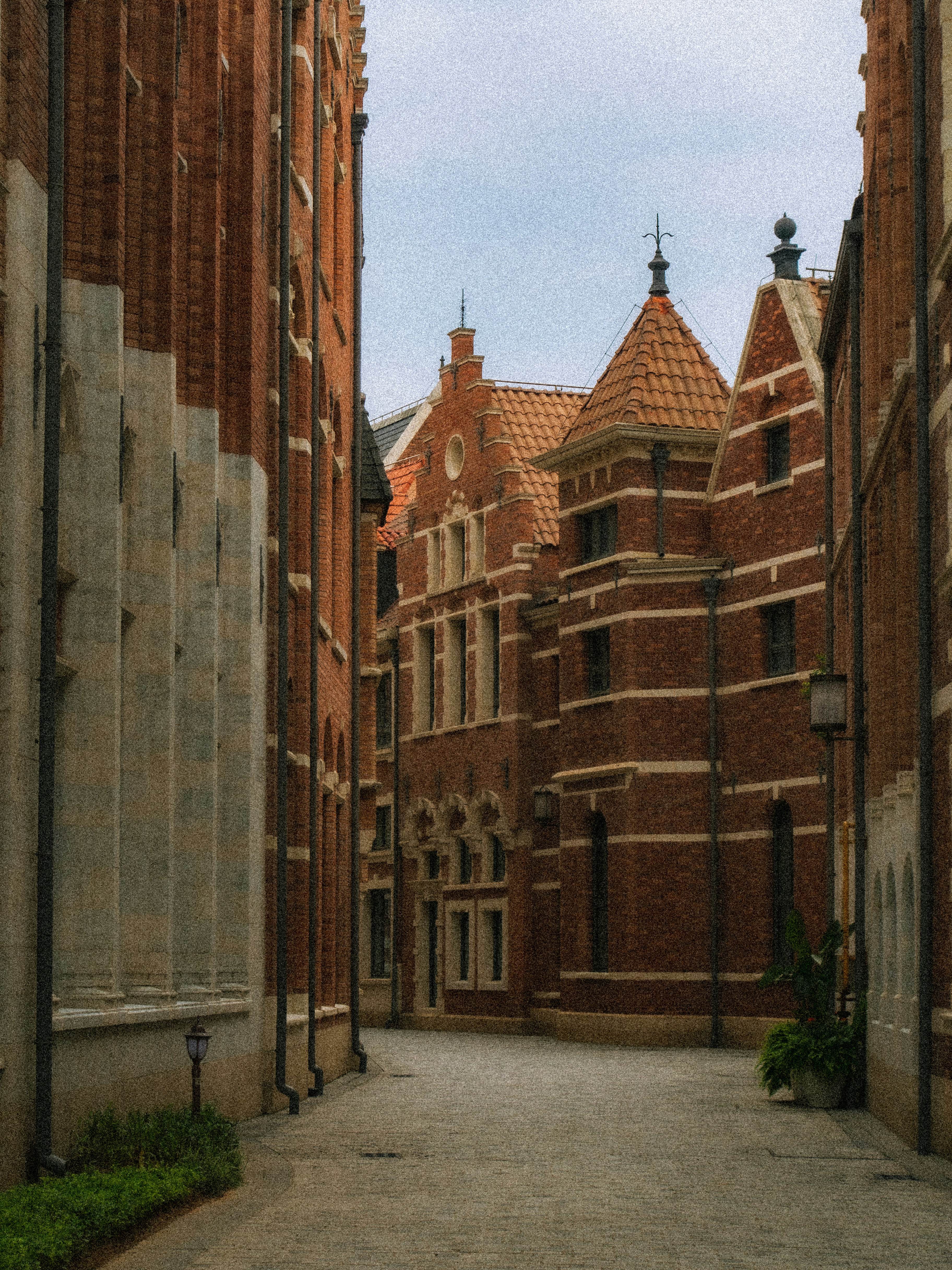 a brick building with a clock tower on top of it