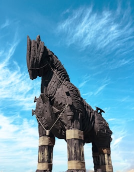 a statue of a horse made out of wood