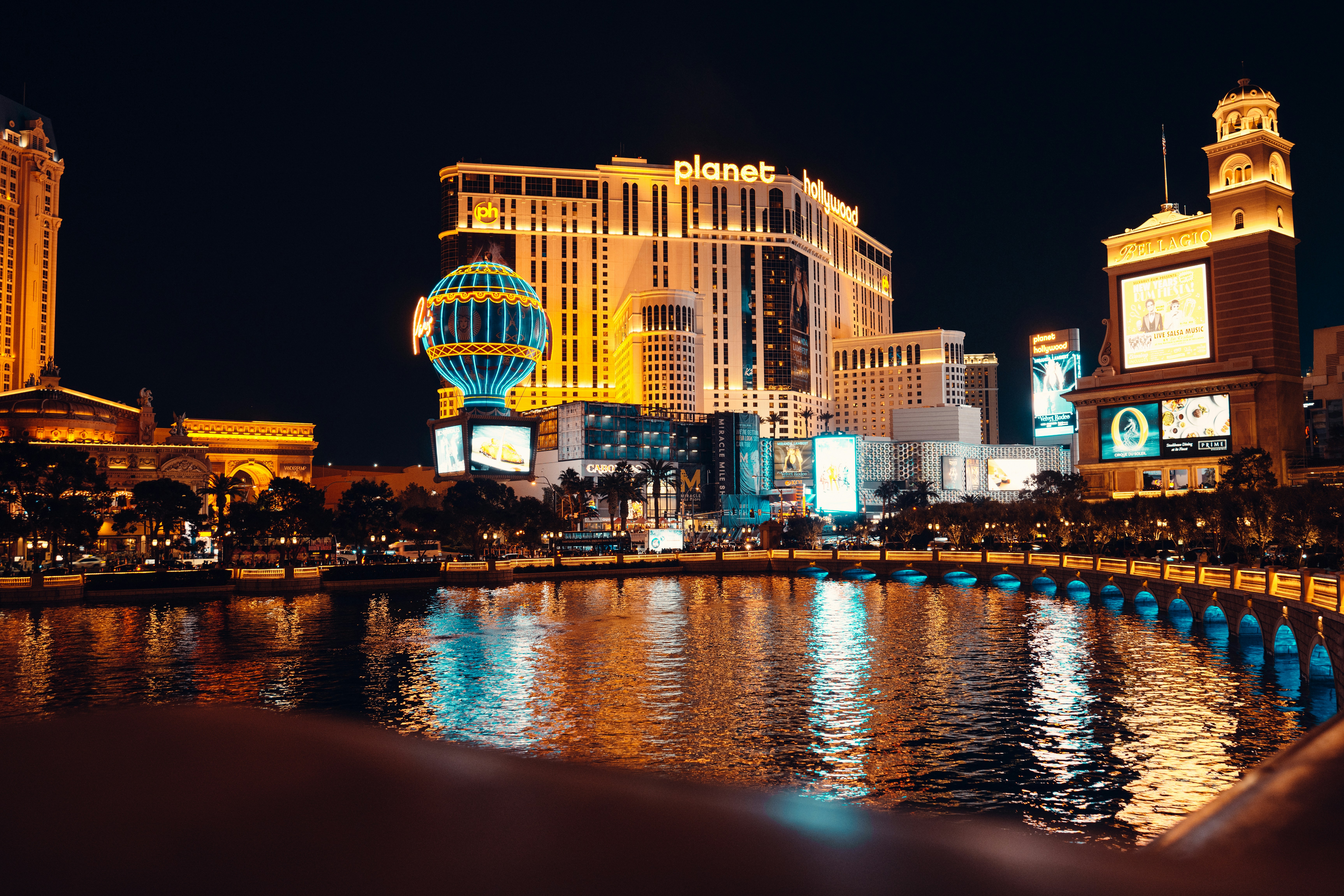 a large body of water in a city at night