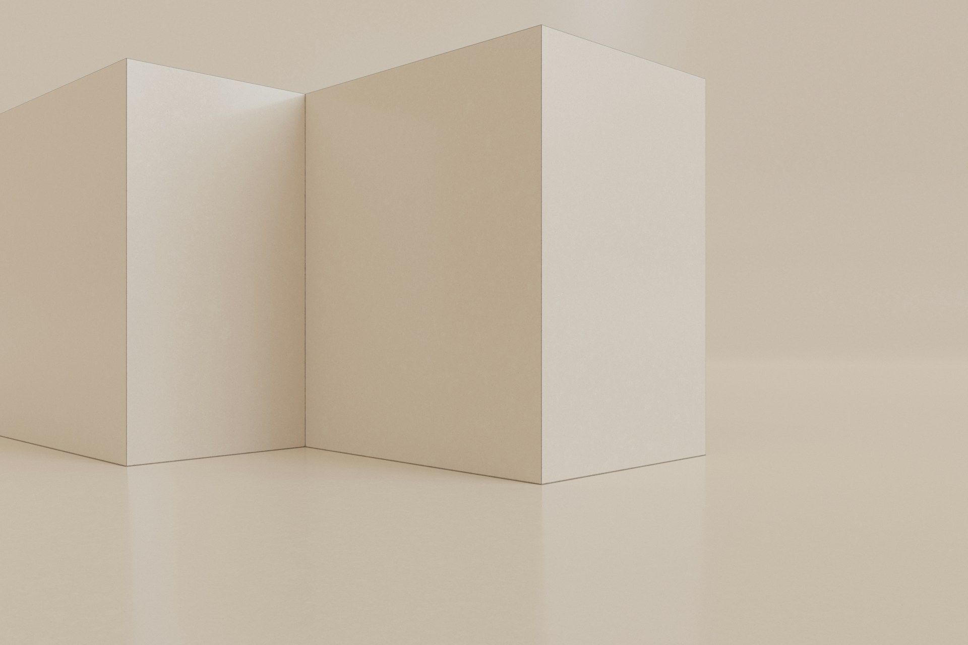 a pair of white boxes sitting on top of a white floor