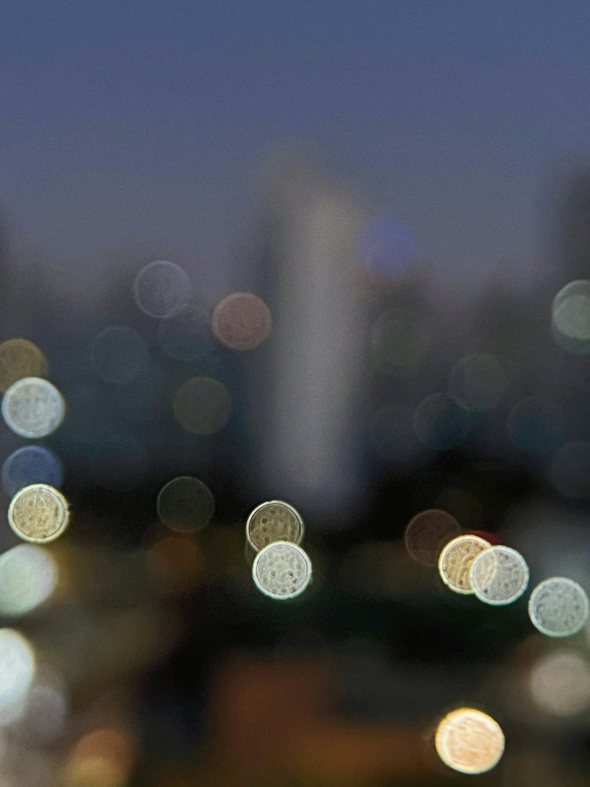 a blurry photo of a city at night