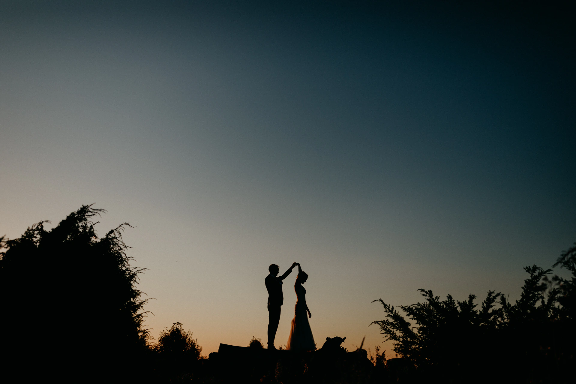 a couple of people standing next to each other