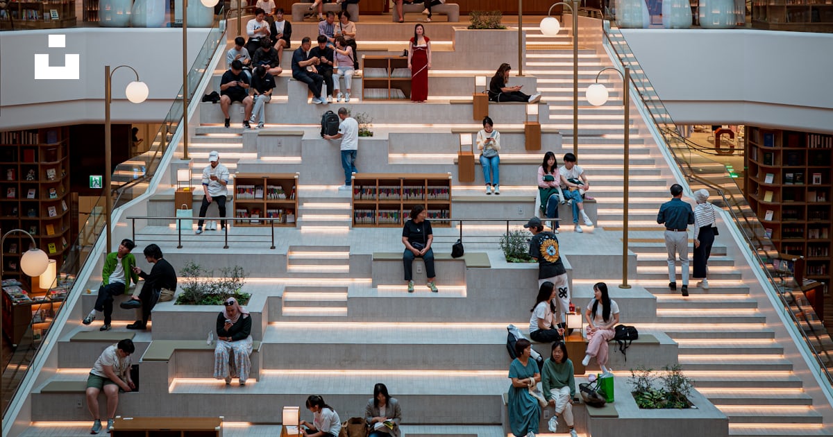 A large library filled with lots of books photo – Free Suseong-ro Image ...