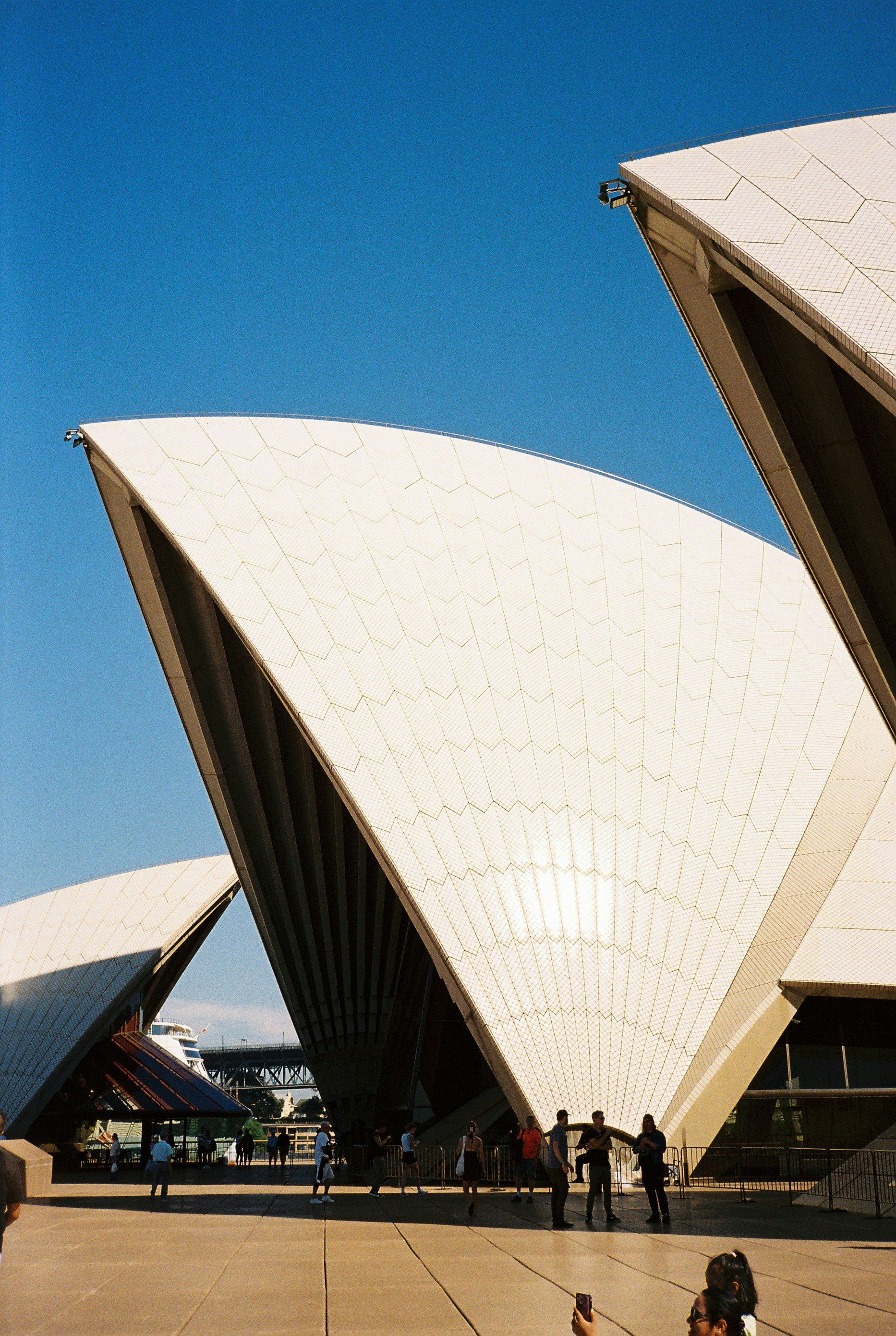 a group of people standing in front of a building