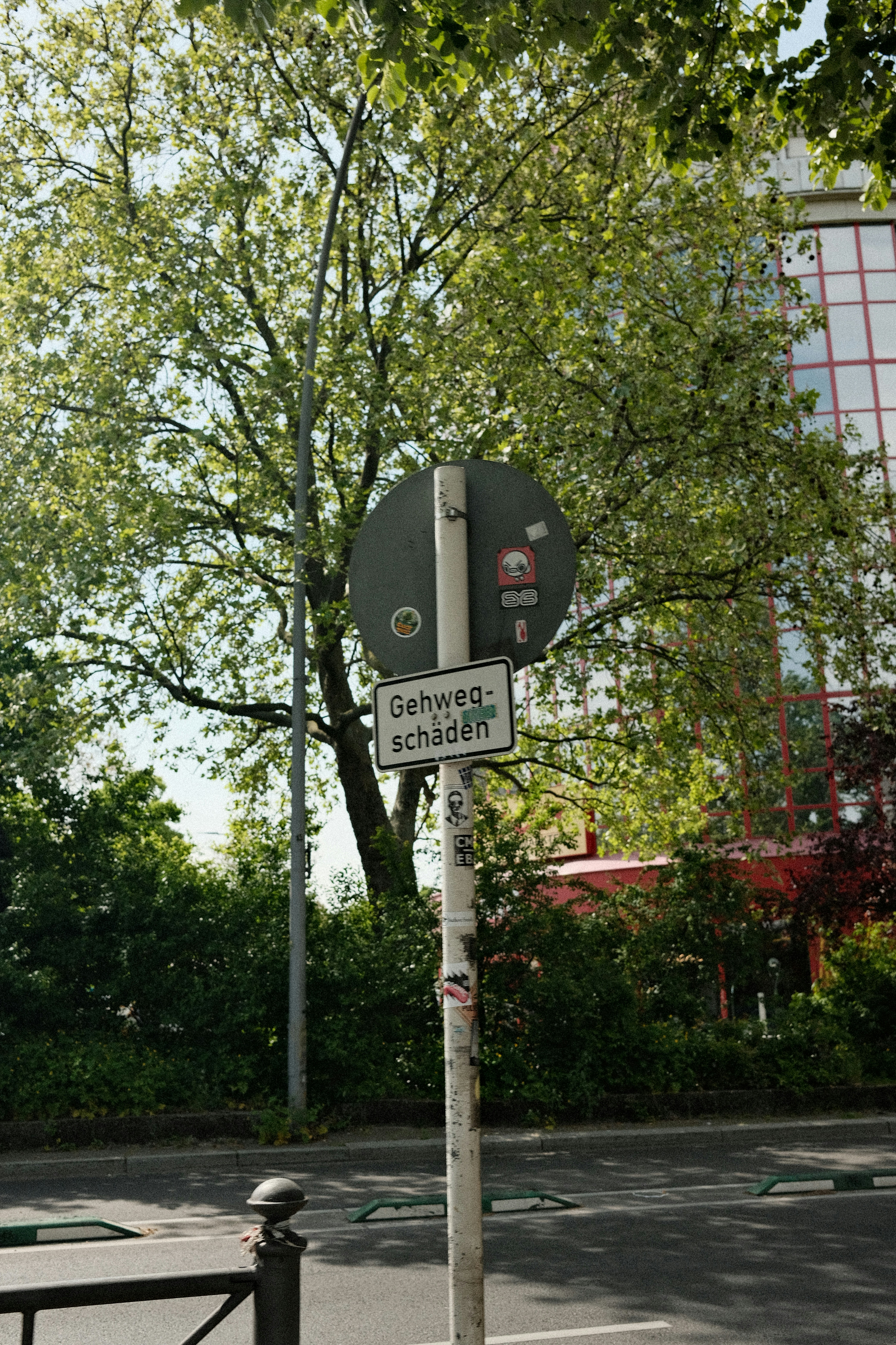 A street sign on the side of the road photo – Free Forest Image on Unsplash