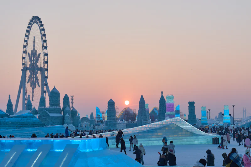 a-group-of-people-standing-around-an-ice-sculpture