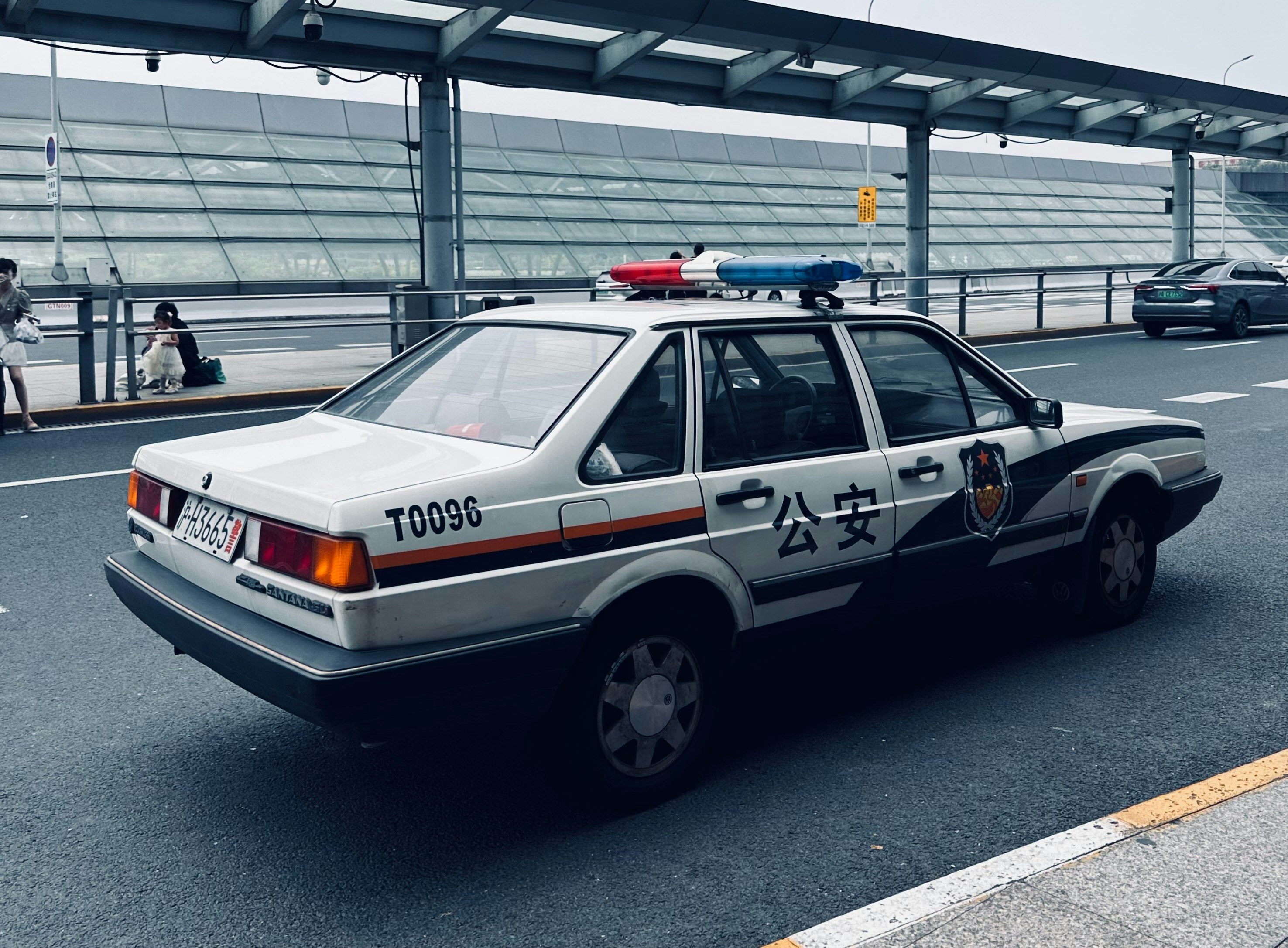 a police car parked on the side of the road