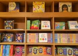 a book shelf filled with lots of children's books