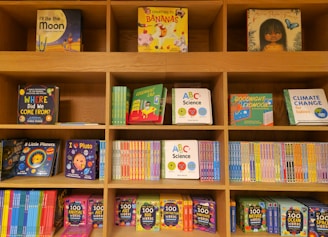 a book shelf filled with lots of children's books