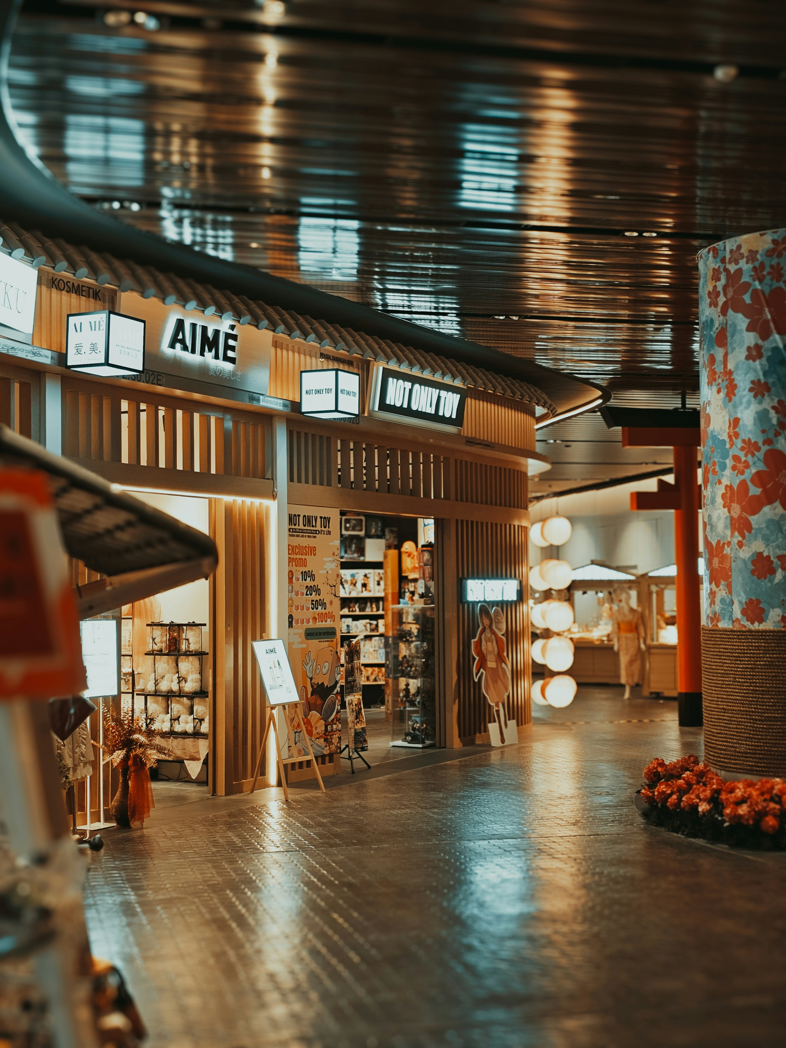 the inside of a store with a wooden floor