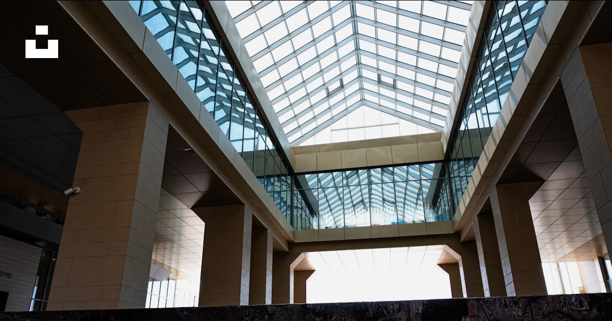 A large atrium with a skylight above it photo – Free Building Image on ...