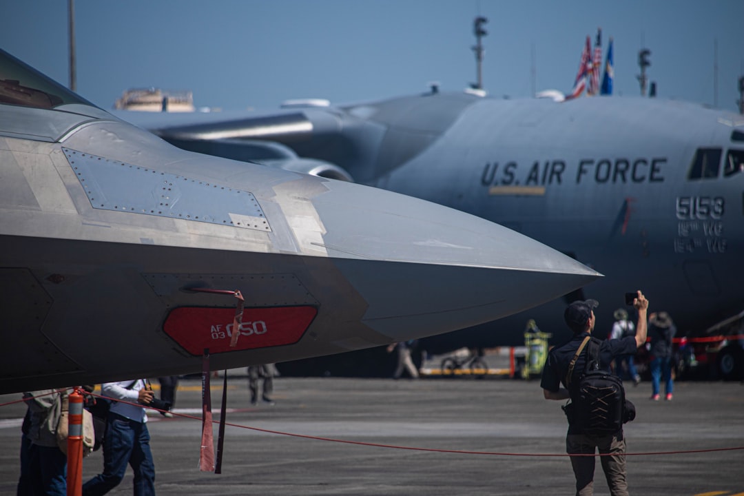 a large air force jet sitting on top of an airport tarmac,