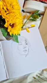 a drawing of a woman next to a sunflower