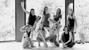 a group of women are posing for a picture