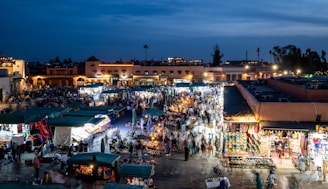 a night market with a lot of people walking around