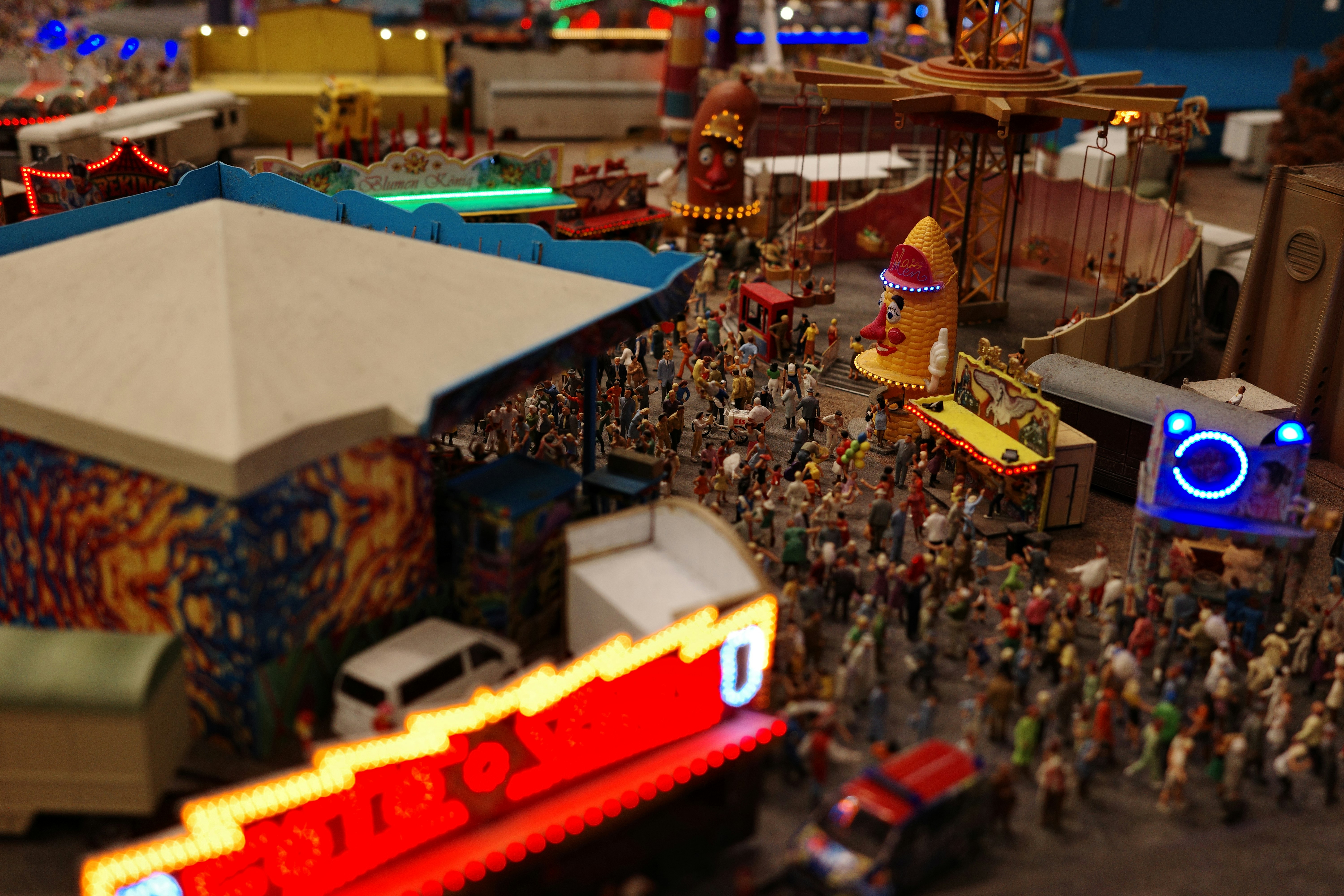 a large group of toy people and a carnival