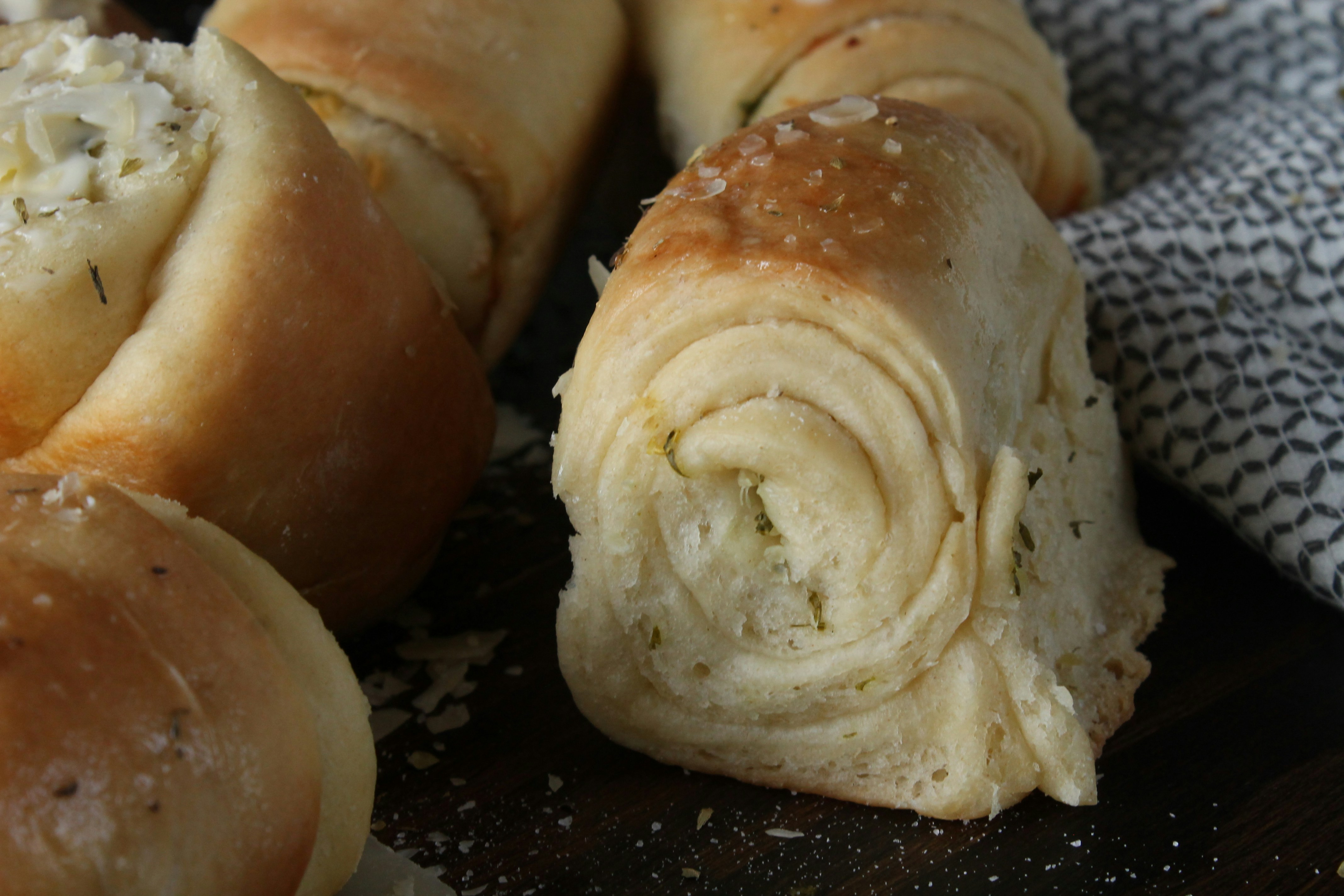 a close up of some bread rolls on a table
