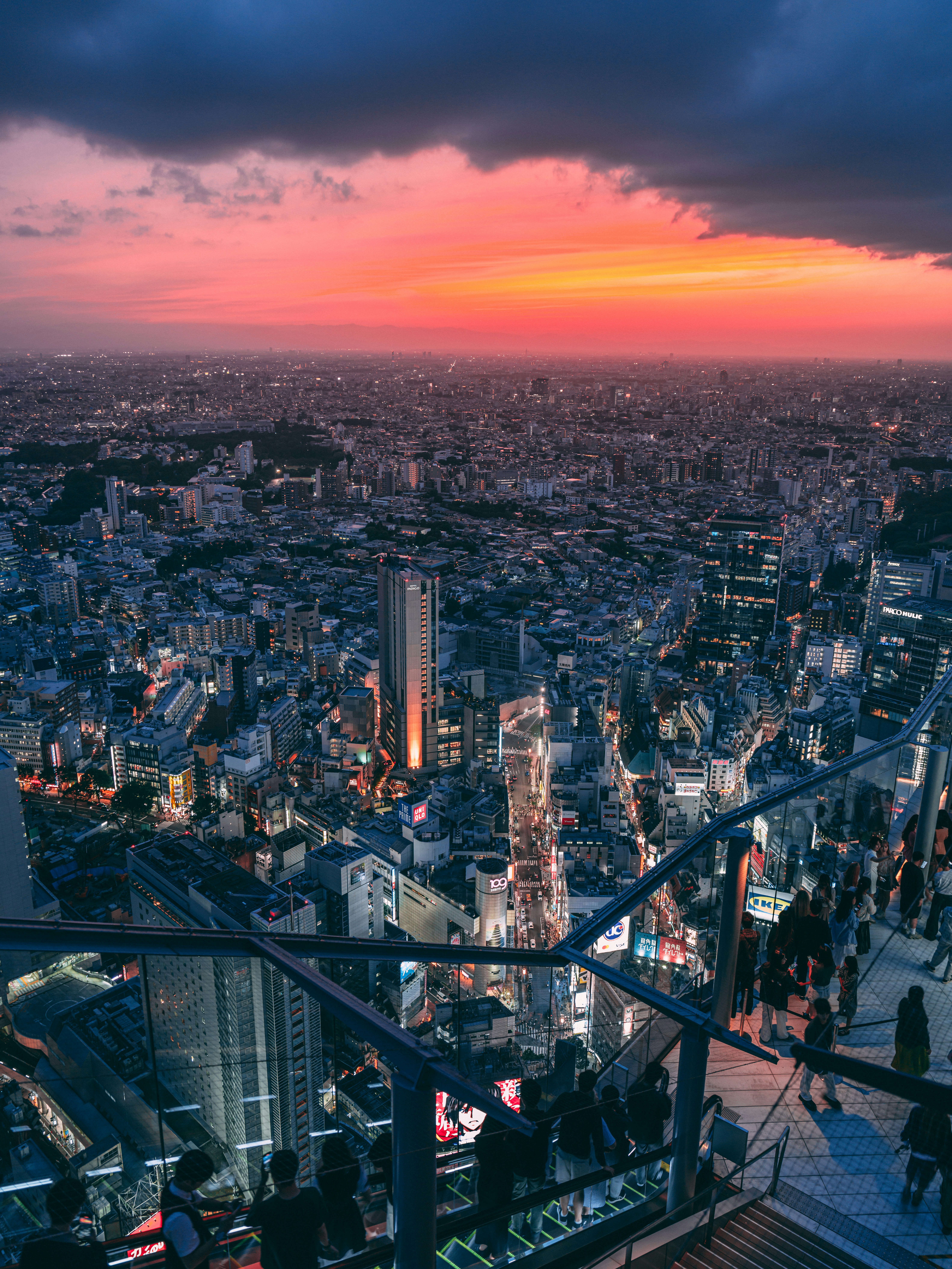 a view of a city at night from a tall building