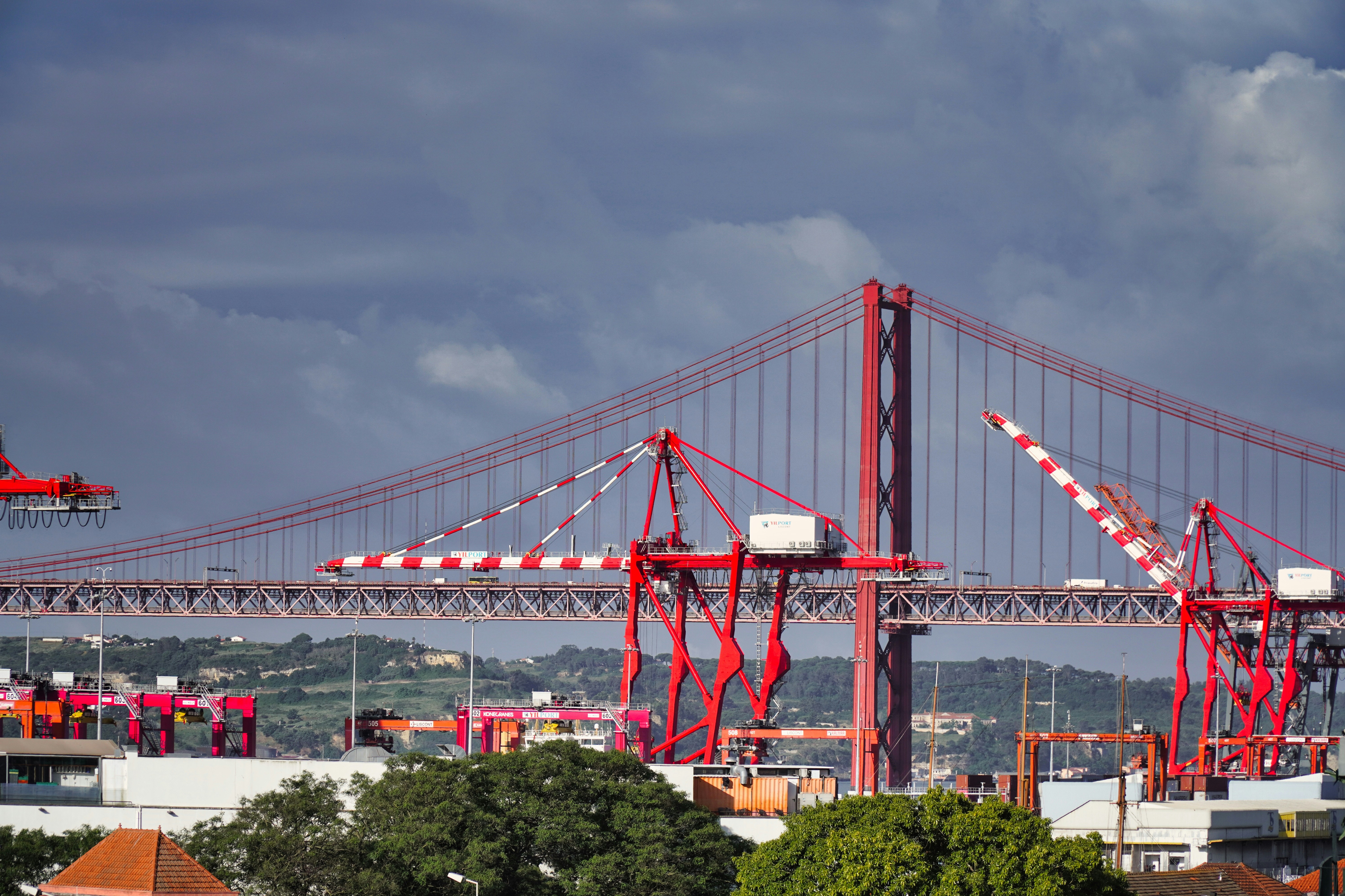 a large bridge with a crane on top of it, 