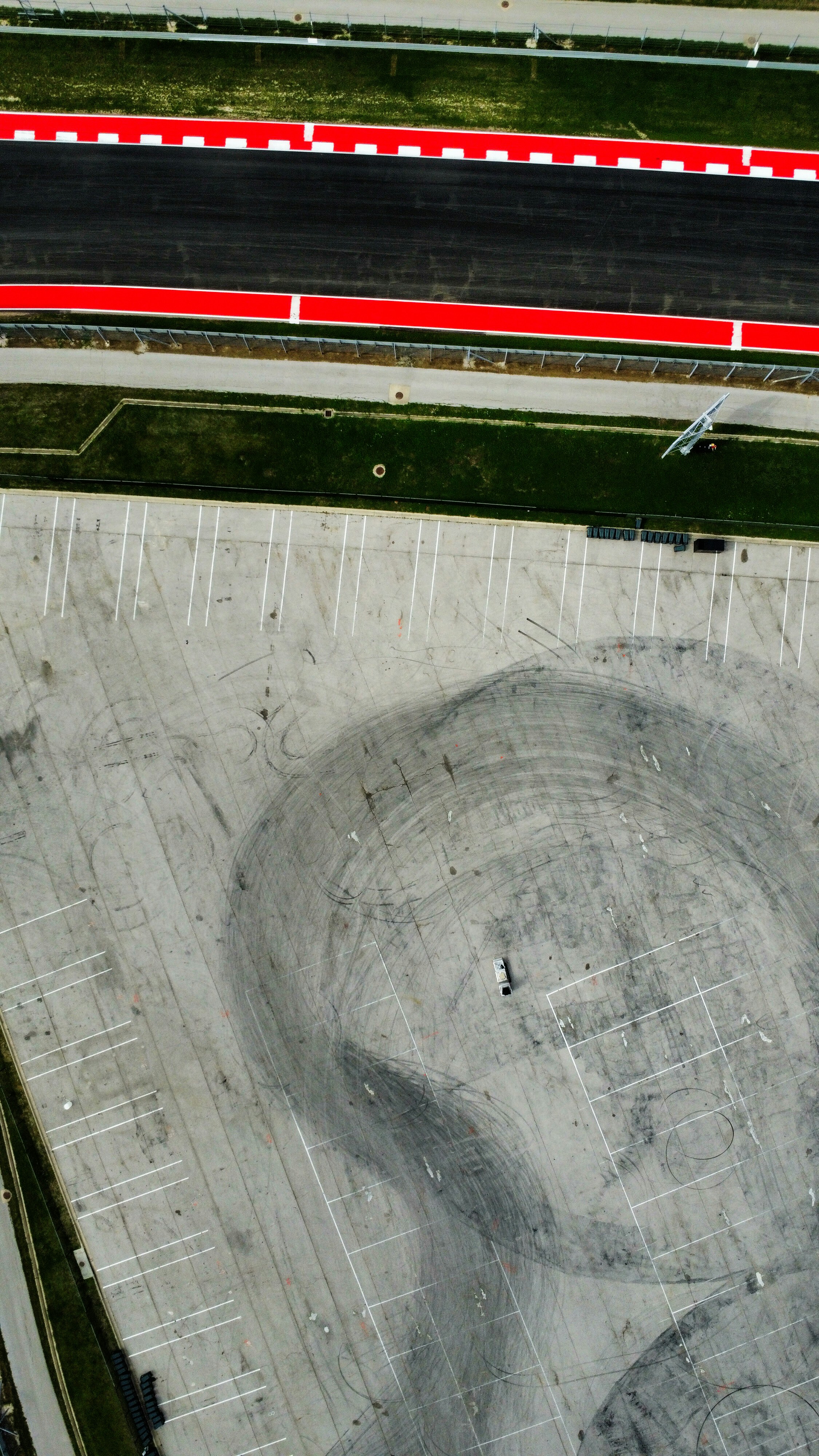 Aerial view of a paved commercial parking lot