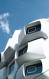 a close up of a building with a sky in the background