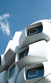 a close up of a building with a sky in the background