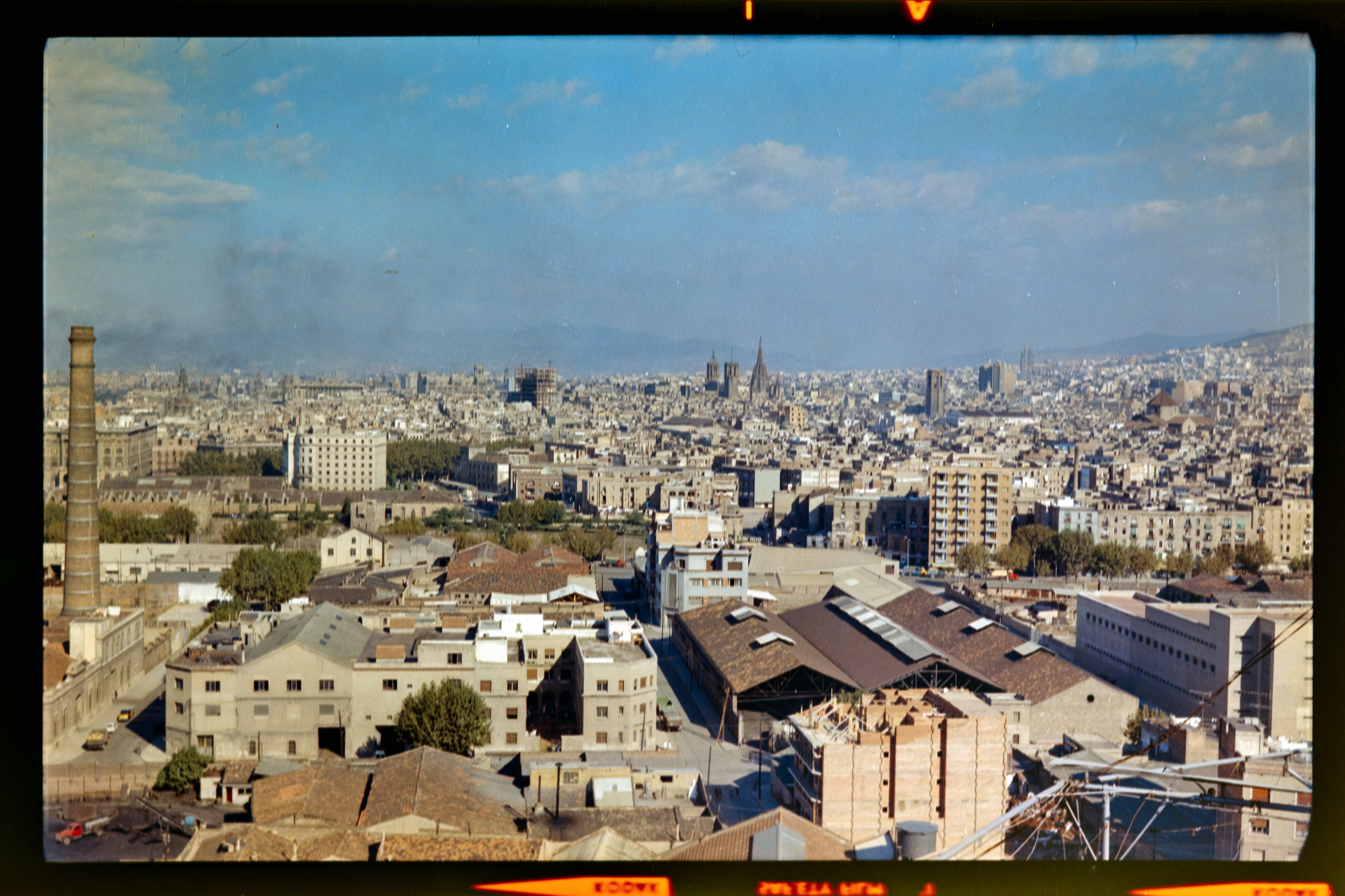 a view of a city from the top of a building