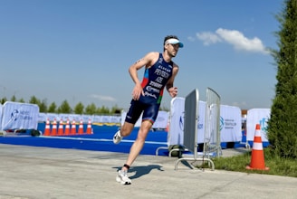 a man running in a race wearing a bib