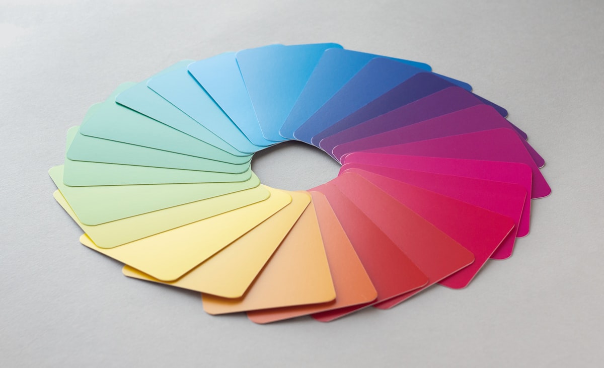 A circle of colour swatches arranged on a white surface
